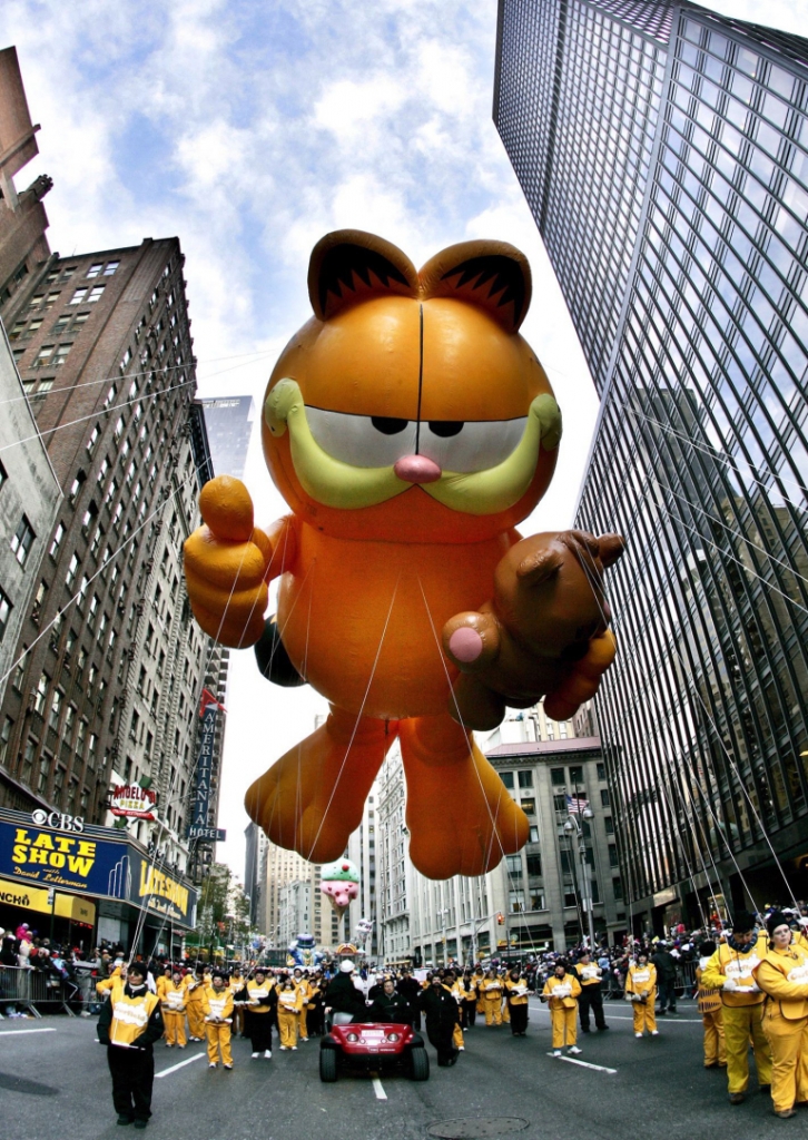 Mandatory Credit: Photo by Peter Foley/EPA/REX/Shutterstock (7589693g) 'Garfield the Cat' Floats Down Broadway at the Macy's 79th Annual Thanksgiving Day Parade in New York City Thursday 24 November 2005 Usa Macys Thanksgiving Parade - Nov 2005